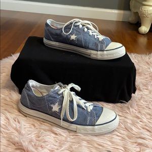 Blue converse tennis shoes